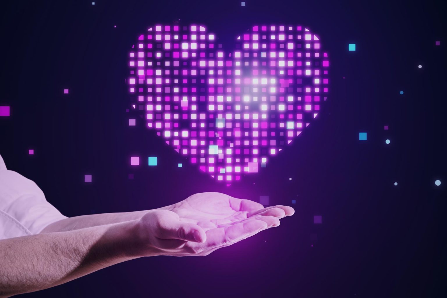 Imagem de uma mão segurando um coração digital iluminado, representando bem-estar digital, tecnologia humanizada e qualidade de vida na era da inovação.
